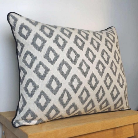 coussin design jacquard géométrique